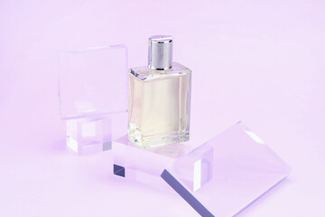 Stylish presentation of perfume bottle on violet background, closeup