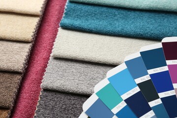 Samples of colorful fabrics and color palettes, above view
