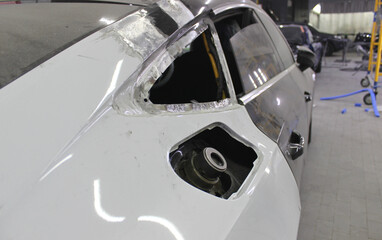 Workshop for dismantling body panels for repair of fuel tanks and fuel systems of cars. Bodywork...
