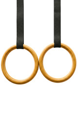 Wooden gymnastic rings with black suspension straps isolated on a transparent background
