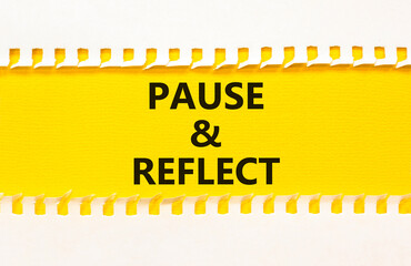 Pause and reflect symbol. Concept words Pause and reflect on beautiful yellow paper on clothespin....