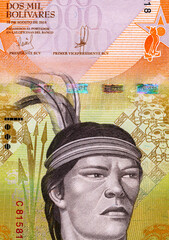 Banknote of 2000 bolivars of Venezuela with the image of Cacique Guaicaipuro, spears, masks. Money...