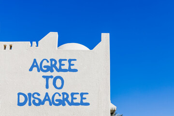 Agree to disagree symbol. Concept words Agree to disagree on beautiful white wall. Beautiful white...