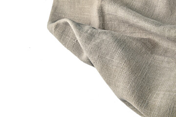 crumpled beige linen tablecloth isolated on white background