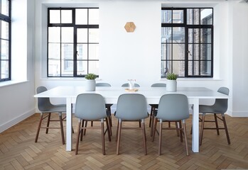A modern and luxurious conference room with a long table and leather chairs