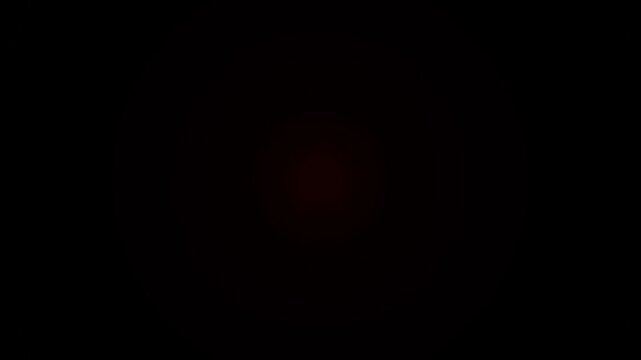 Police light flashing in the dark with optical lens flare and white road signal line animation 4k video. Optical lens flare effect with police lights flashing