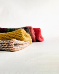 Colorful wool hats, on a white background.