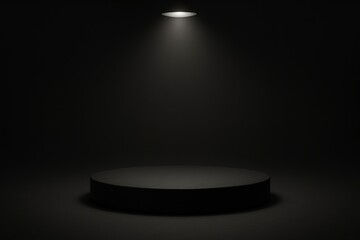 Black podium illuminated by spotlight in dark studio setting for product display and presentation