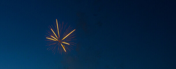 Fototapeta premium One firework in blue night sky,banner.