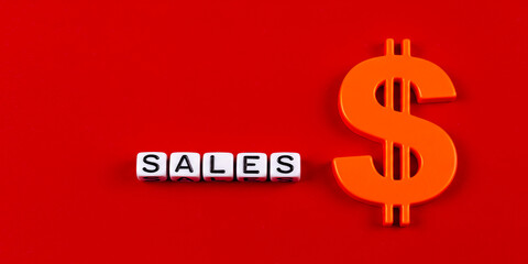 Obraz premium Orange dollar sign shining beside sales dice on a vibrant red stage symbolizing prosperity and on transparent background