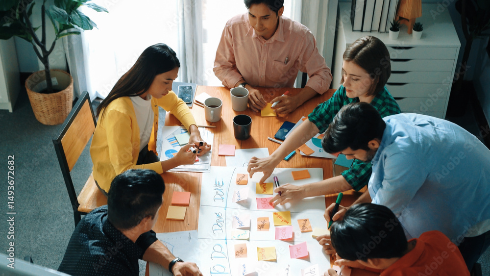 Poster top view of diverse business people drawing mind map by using marker while brainstorm idea and writi