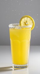 A glass of yellow drink with lemon slice and salt rim