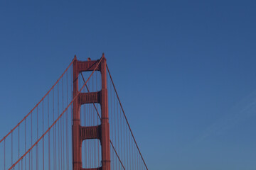 Golden Gate Tower Viewed from Below Against Blue Sky