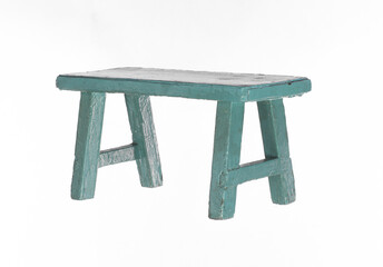 green rustic wooden stool isolated on white background