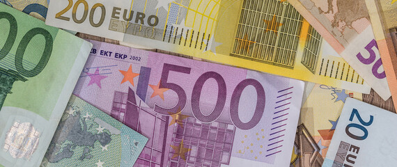 close up of pile of paper euro banknote, finance background