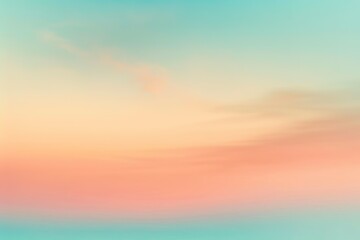 Dreamy sunrise sky with pastel colors blending from blue to peach in a soft gradient