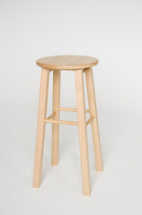 wooden beige high stool on white background, isolate
