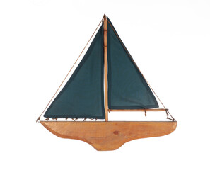 decorative wooden ship sailboat isolated on white background