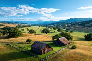 Aerial barn landscape view of rural farm with rolling hills