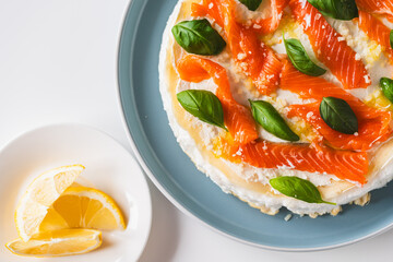Omelette Poulard. Omelette of Mother Poulard. French omelette with whipped egg whites, lightly salted trout and basil. Beautiful, healthy and tasty breakfast. Top view. Close-up. Copyspace