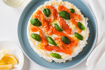 Omelette Poulard. Omelette of Mother Poulard. French omelette with whipped egg whites, lightly salted trout and basil. Beautiful, healthy and tasty breakfast. Top view. Close-up. Copyspace