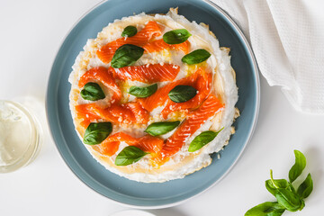 Omelette Poulard. Omelette of Mother Poulard. French omelette with whipped egg whites, lightly salted trout and basil. Beautiful, healthy and tasty breakfast. Top view. Copyspace