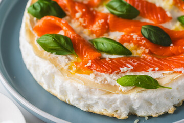 Omelette Poulard. Omelette of Mother Poulard. French omelette with whipped egg whites, lightly salted trout and basil. Beautiful, healthy and tasty breakfast. Copyspace
