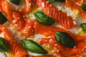 Background with texture of Omelette Mother Poulard. French omelette with whipped egg whites, lightly salted trout and basil. Use for banner and menu. Top view. Close-up. Copyspace