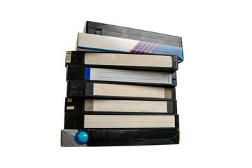 Stack of old VHS tapes with blank labels, isolated on transparent background.