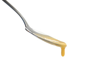 Delicious melted cheese flowing down from spoon isolated on white