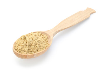 Dry ginger powder in wooden spoon isolated on white