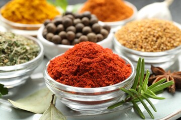 Many different aromatic spices on table, closeup