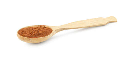 Nutmeg powder in spoon isolated on white