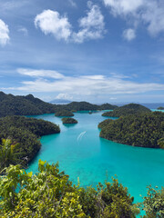 Fototapeta premium Remote lagoon at Wayag island consisting of limestone islands, Raja Ampat, West Papua, Indonesia