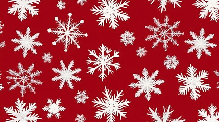 Festive pattern of snowflakes against a deep red background.