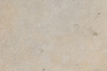 Textured porous backdrop with warm beige, earthy tones and patterns