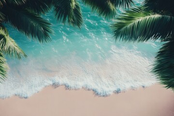 Tropical beach scene with palm trees and ocean waves under a clear blue sky
