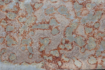 Polished metal with wavy rust patterns, artful textures create visual harmony in a captivating backdrop