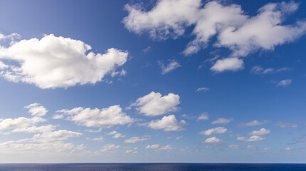 Cloudy Sky Over the Blue Pacific Ocean on a Bright Day
