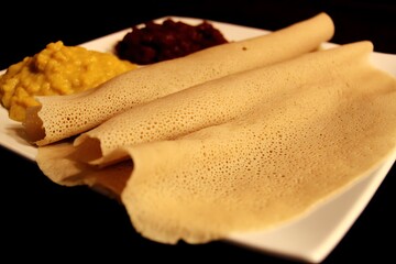 Ethiopian injera with sides on plate