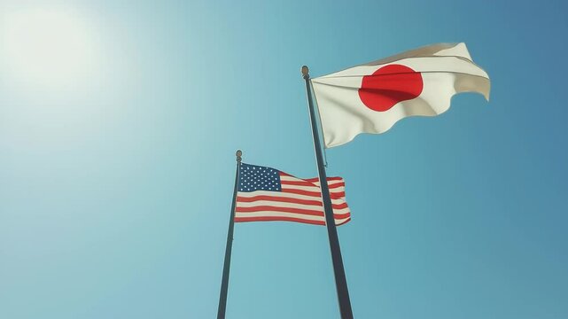 青空に並ぶ日本とアメリカの国旗