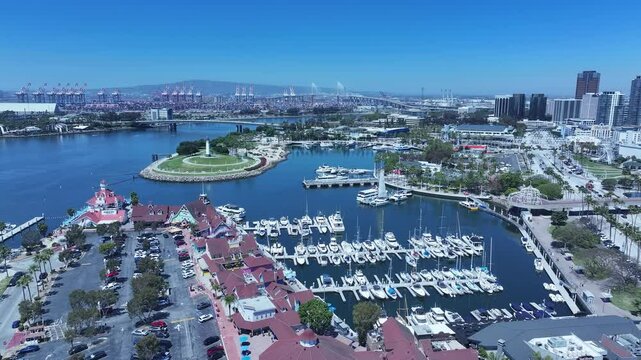 Aerial Long Beach city California marina port overhead 1. Coastal city near Los Angeles. Cargo and container ship terminal. Cruise ship destination. Seaside resort boat marina and park.