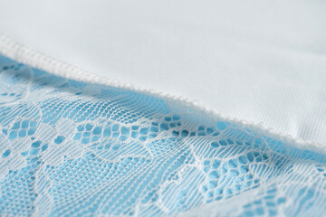 Close-up of white women's negligee fabric. Negligee, fashion