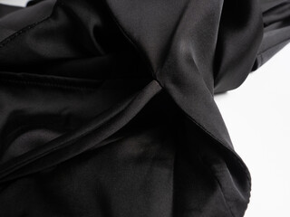 Close-up of black silk fabric. Background, texture