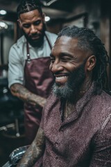 Barber styling a smiling client's hair in a modern salon setting