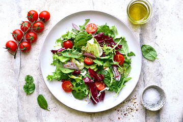 Fresh vegetable salad. Top view with copy space.