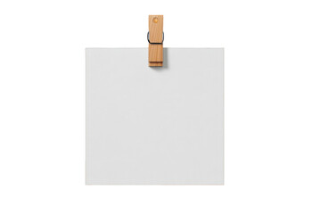 Blank white paper note held by a wooden clip isolated on white background perfect for mockups and presentations