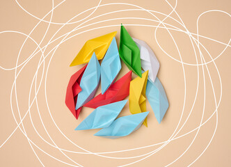 Colorful origami paper boats are gathered in the center, surrounded by random lines, symbolizing...