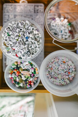 Engaging montessori sensory play with alphabet beads