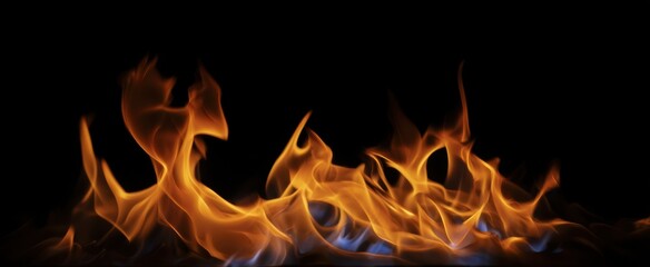 Fototapeta premium The captivating beauty of flames dancing against a black background